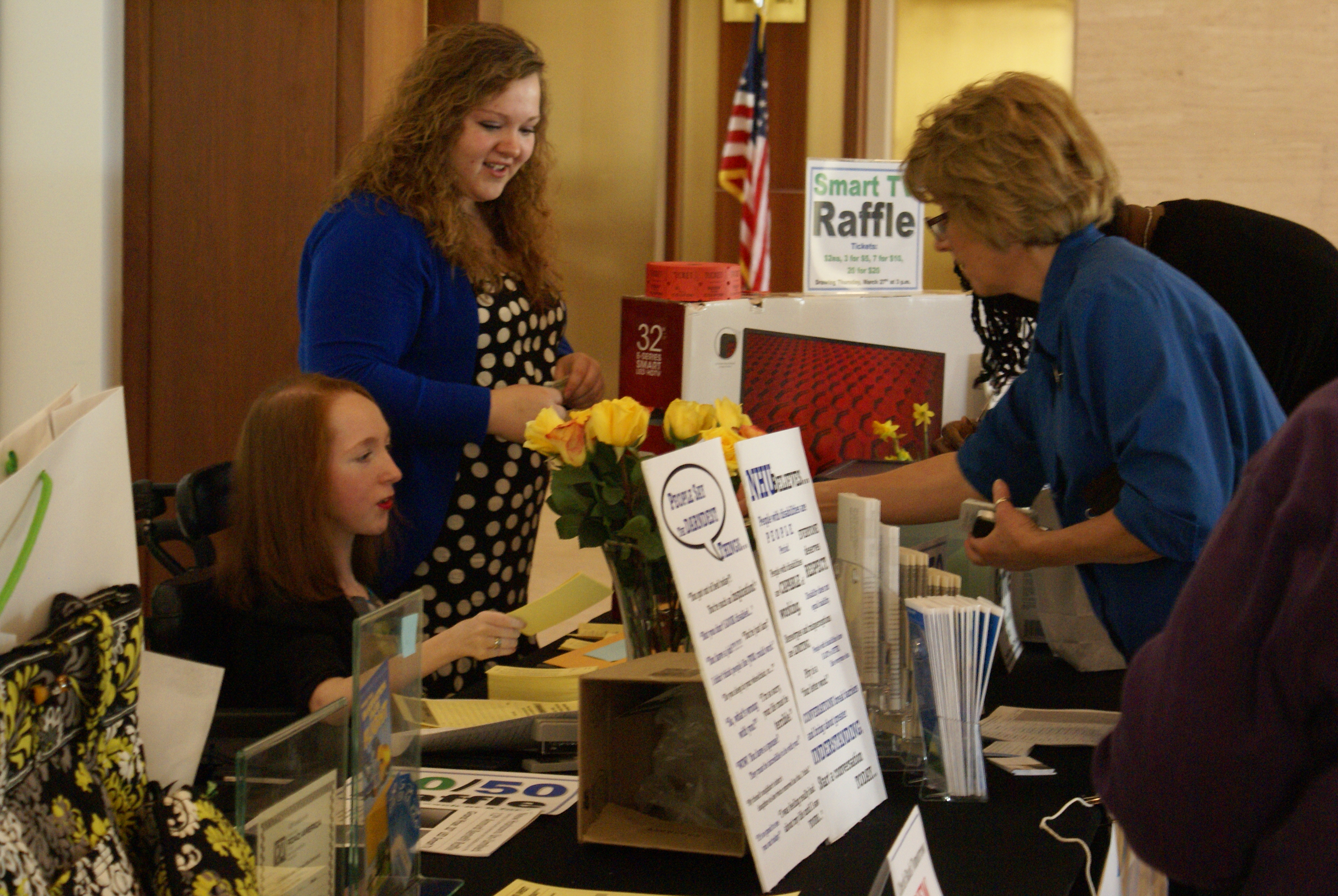 Raffle participants purchasing tickets from our NHU volunteers at our event