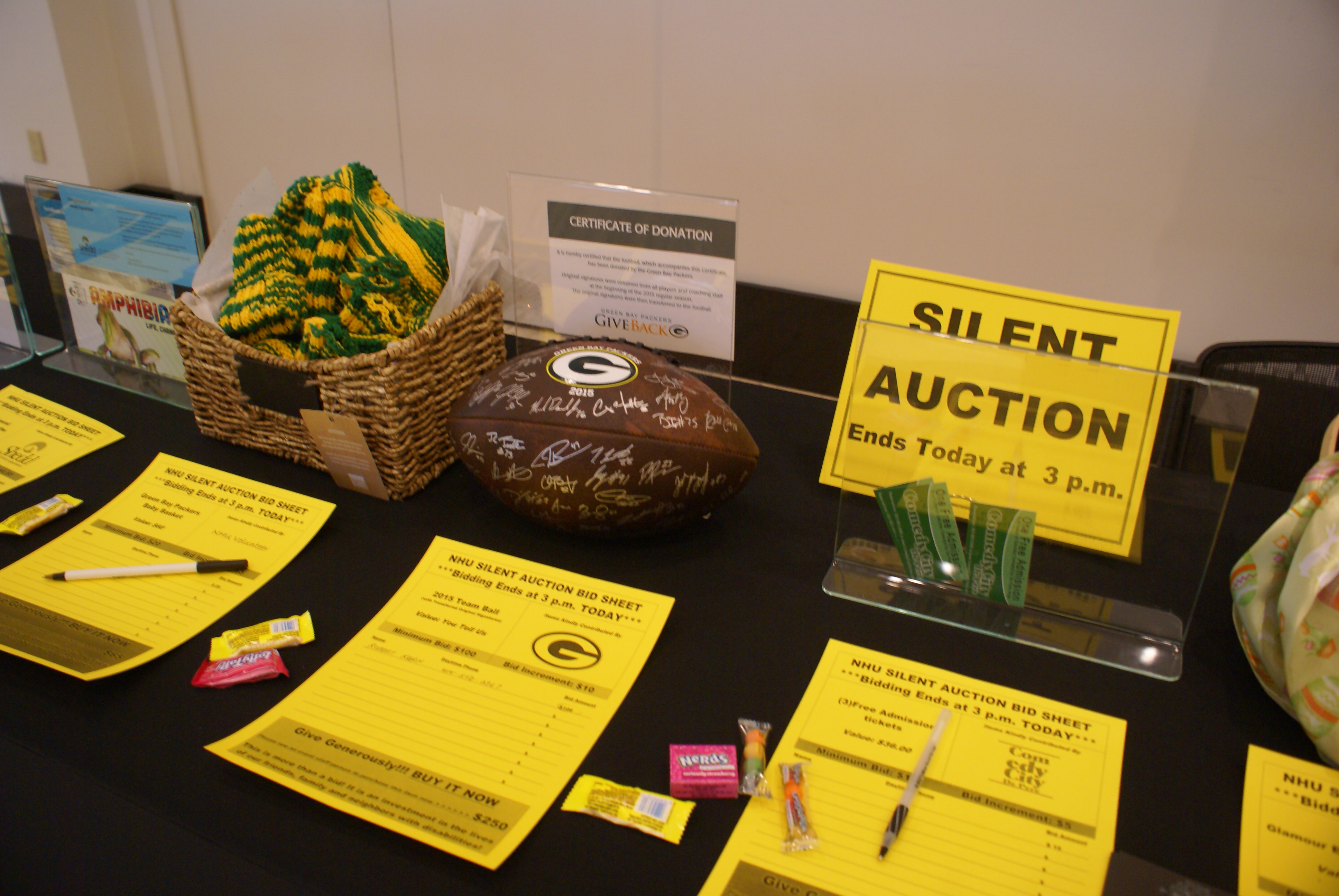 Silent Auction prizes including Green Bay Packers Ball and Baby Basket