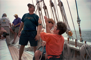 Community of people coming together to sail a ship