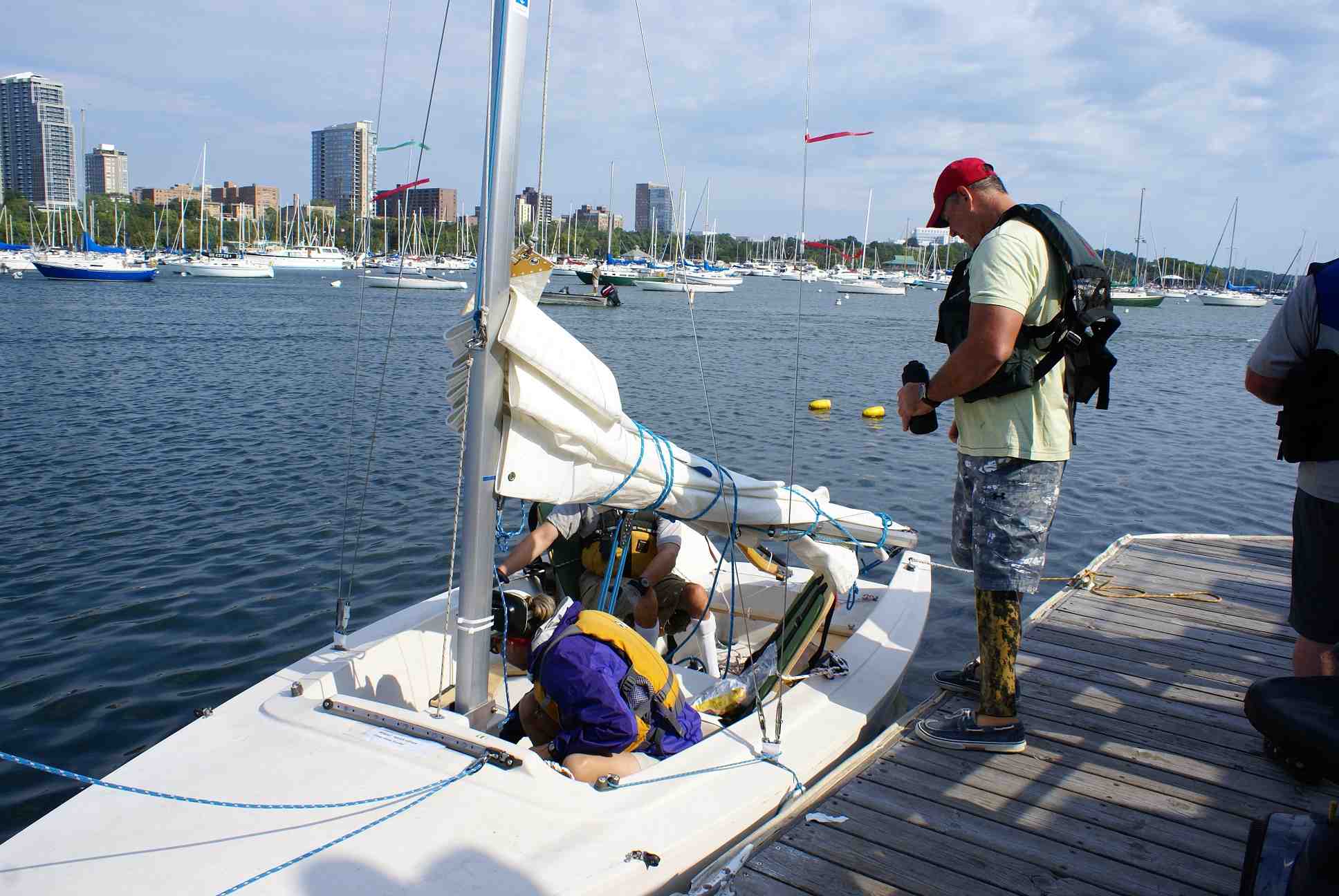 MCSC Volunteers and sailors on dock and ramp