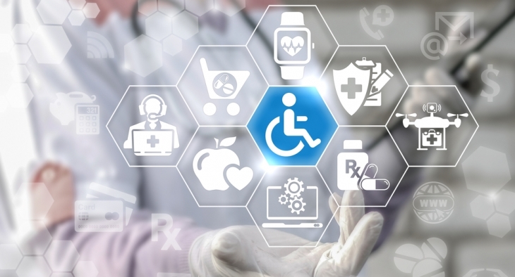 symbols of health care circling a symbol of disability with health care hand in background